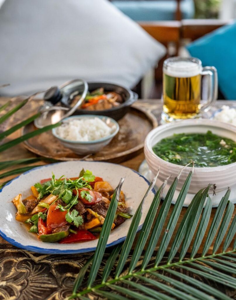Delicious traditional Vietnamese dishes at The DeckHouse, An Bang Beach, perfect for a romantic Valentine’s Day dinner.