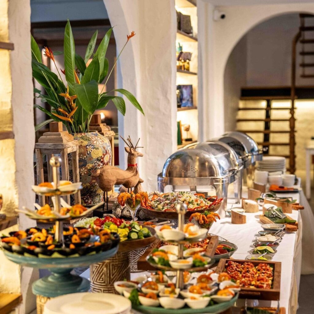 Gourmet Christmas Eve buffet at The DeckHouse, An Bang Beach, featuring festive dishes and family-friendly holiday activities in Hoi An.
